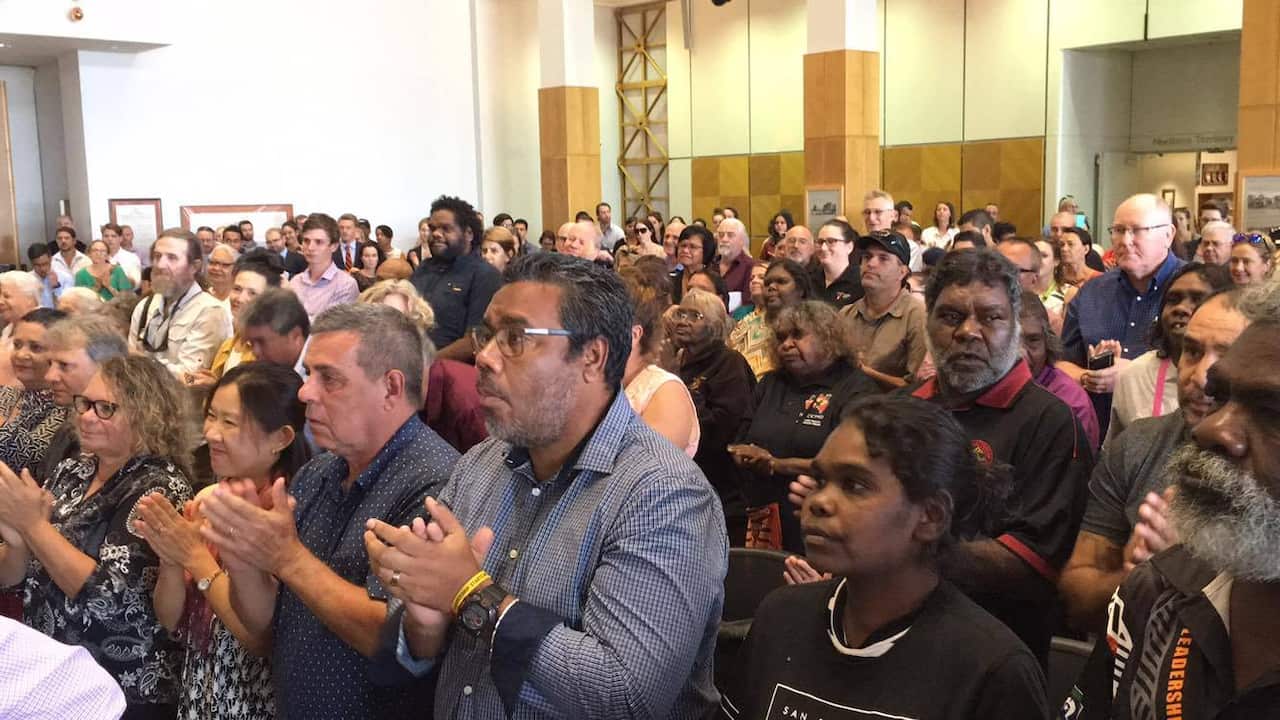 Applause at the release of the final report of the Royal Commission. 