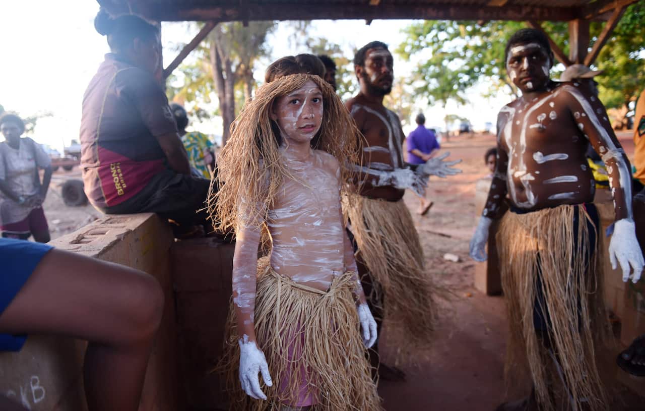 The Injinoo Dance Group rehearse before performing during a welcome to country ceremony