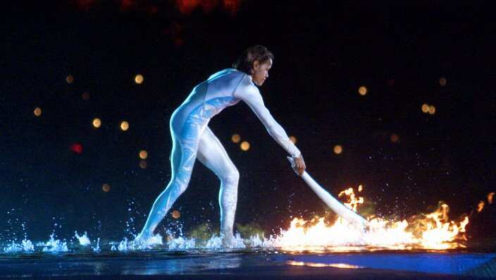 Australian Olympic athlete Cathy Freeman ignites the Olympic flame during the opening ceremony for the Summer Olympics Friday, Sept. 15, 2000, at Olympic Stadium in Sydney. 