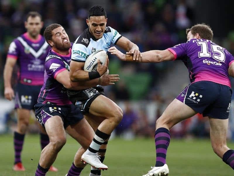 Valentine Holmes of the Sharks is tackled