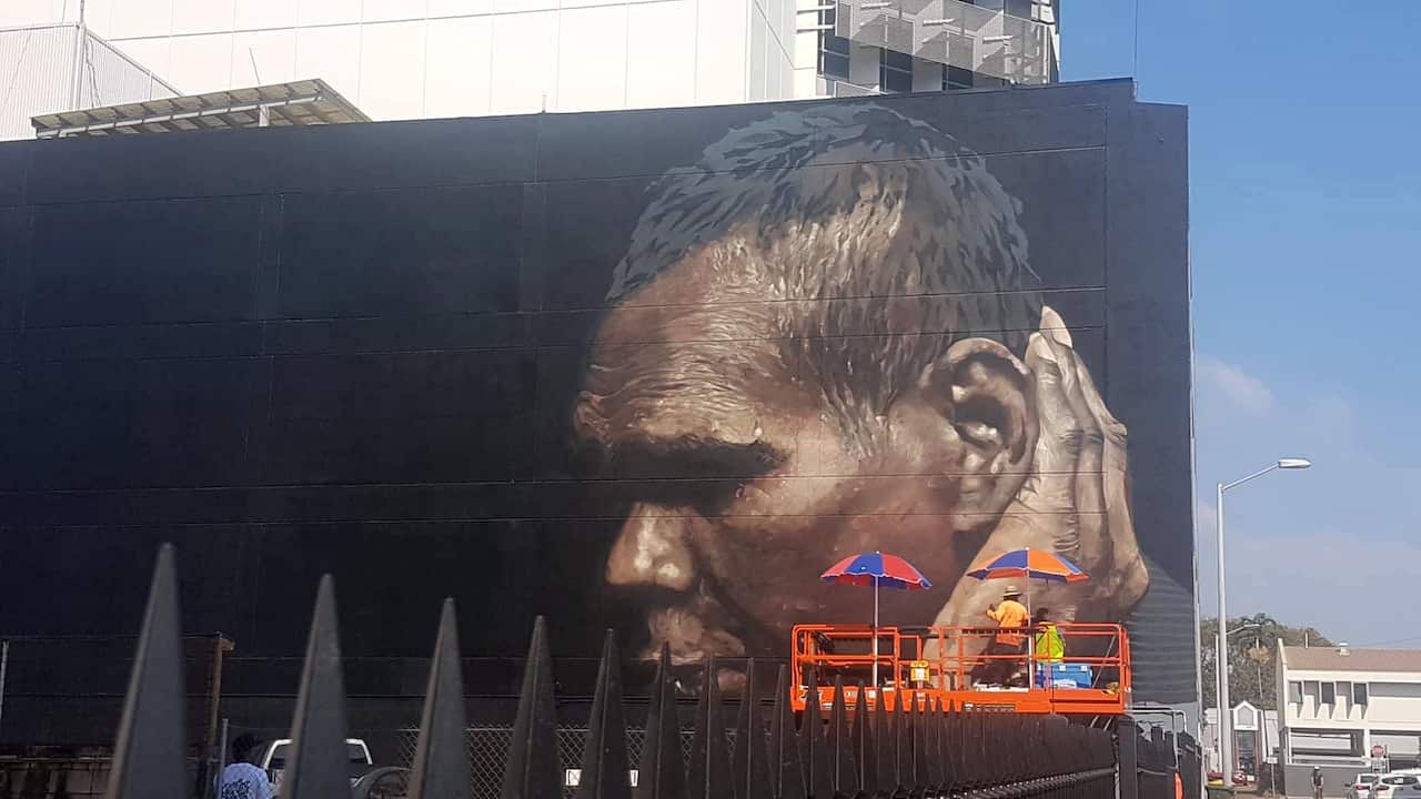 Street art of Dr G Yunupingu underway, 10 September 2018