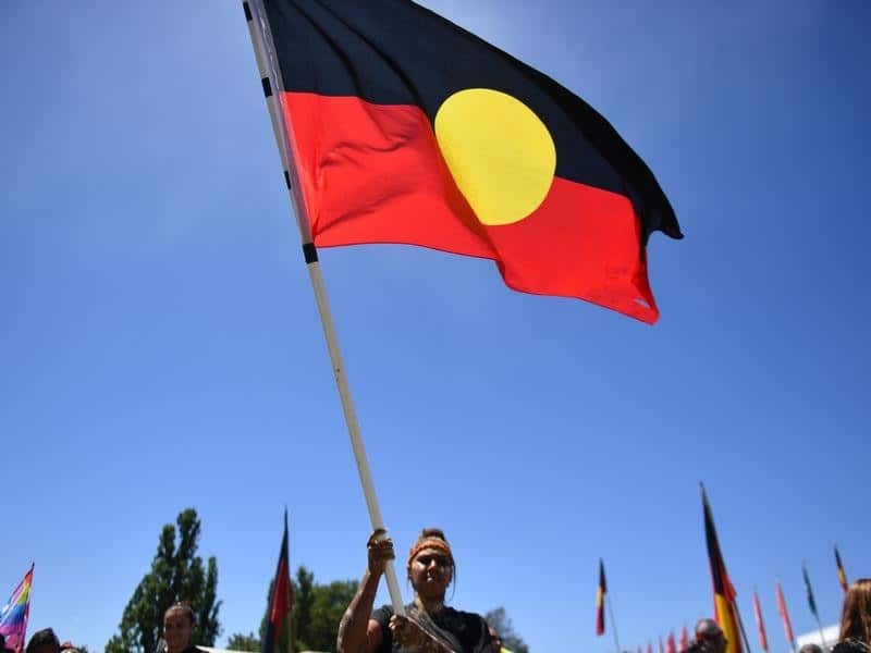 Protestors at an Invasion Day rally at the Aboriginal Tent Embassy