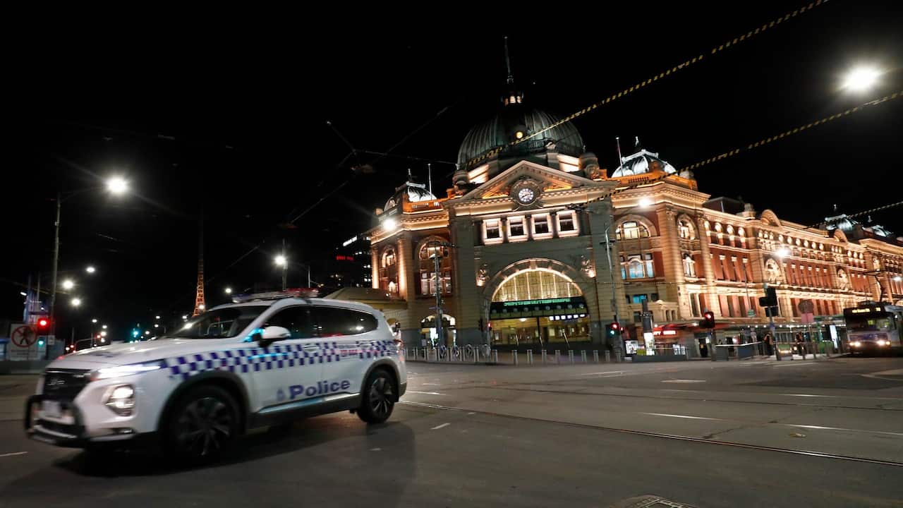 Victorian Police begin curfew Patrols outside Flinders Street, Melbourne.