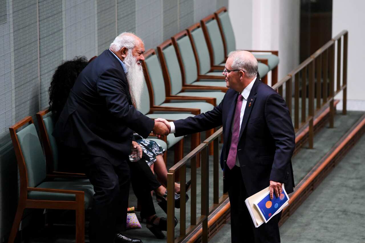 Prime Minister Scott Morrison shakes hands with Labor Senator Pat Dodson as he delivers the Closing the Gap report earlier this year.