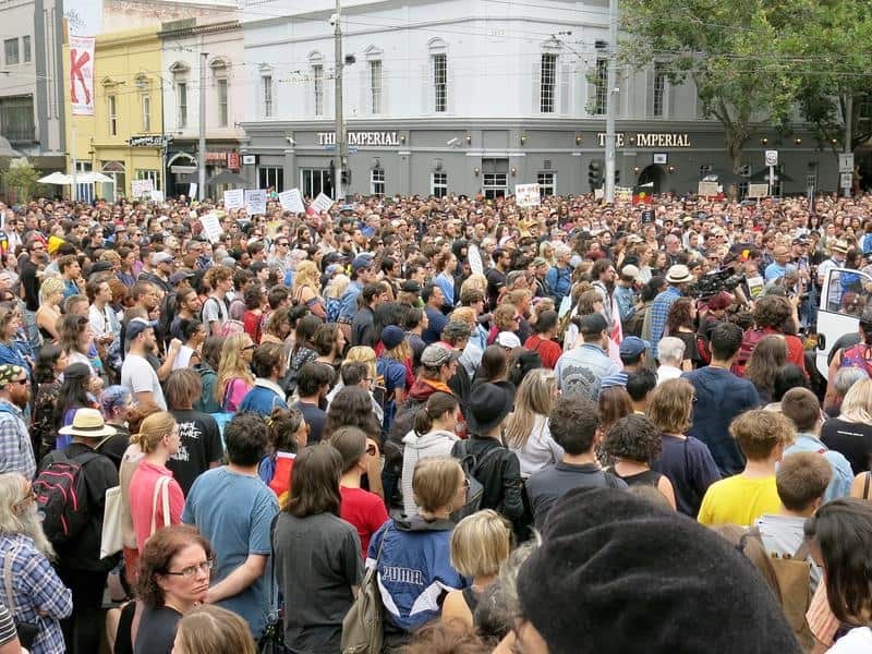 People attend an Invasion Day protest march in Melbourne