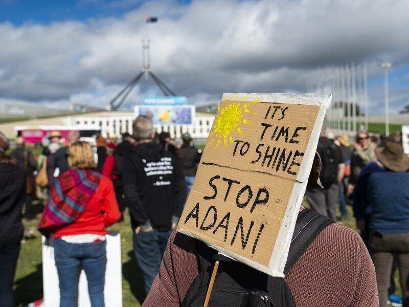 Anti-Adani protesters outside Parliament House in Canberra