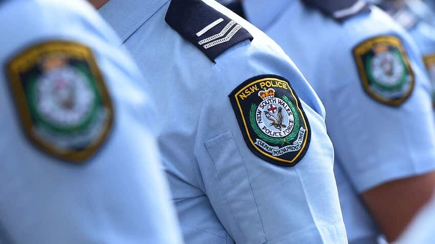 New South Wales Police badges are seen in Sydney, Thursday, Sept. 3, 2015. 
