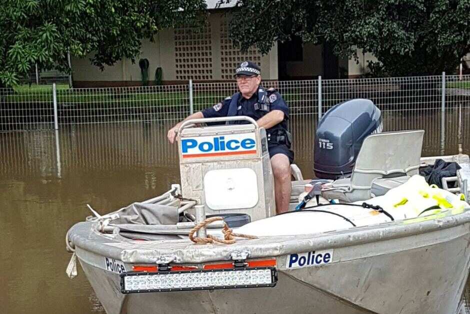 Police in floodwaters in the Northern Territory Daly River Region