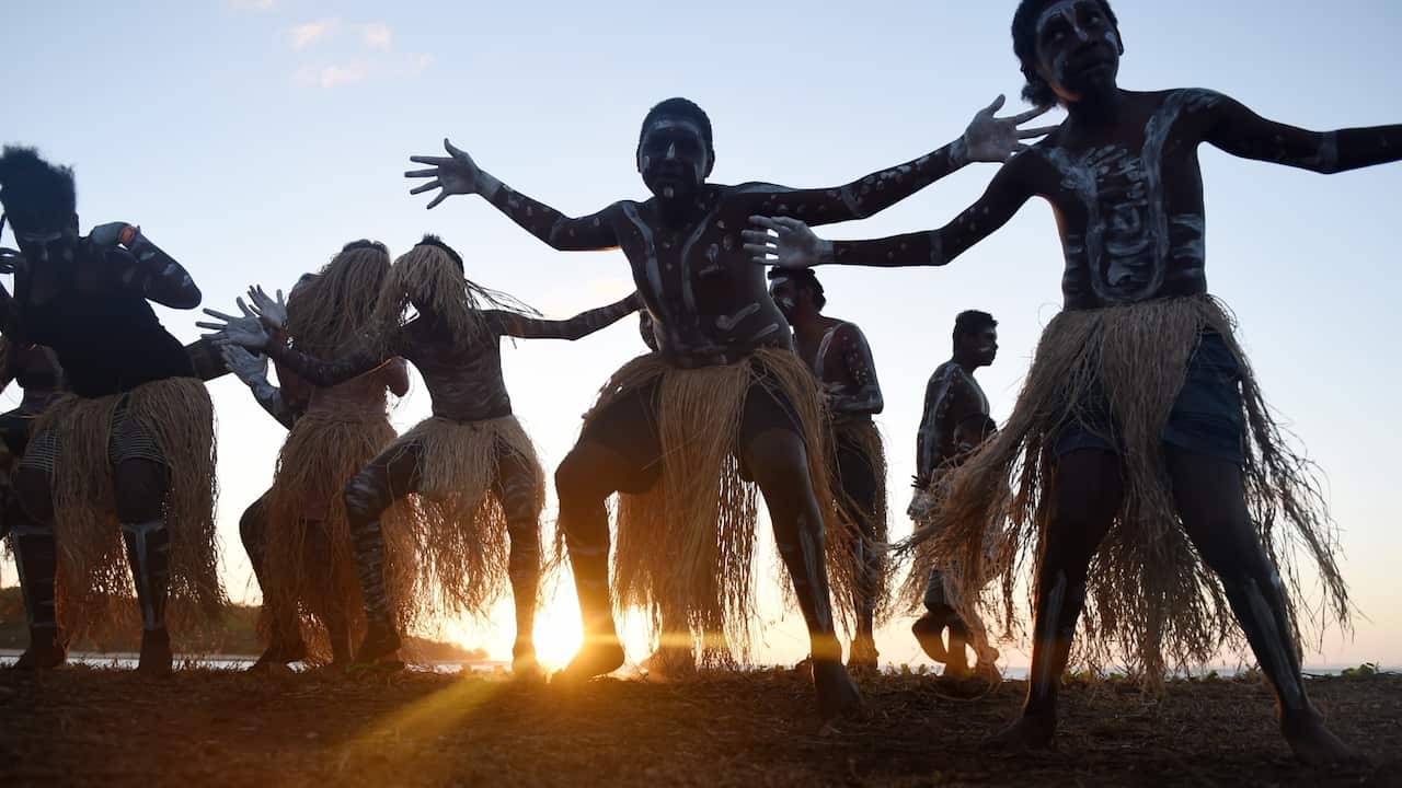 The Injinoo Dance Group rehearse before performing during a welcome to country ceremony for Australian Prime Minister Tony Abbott on the Injinoo Foreshore, Bamaga, Northern Peninsula- Tracey Nearmy - AAP