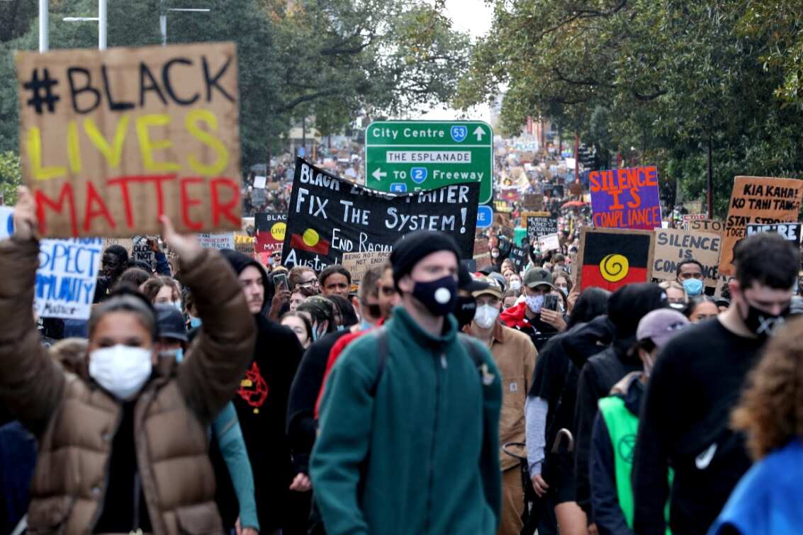 Protesters participate in a Black Lives Matter rally at Langley Park in Perth.