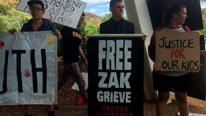 Dylan Voller, centre, with other protesters.
