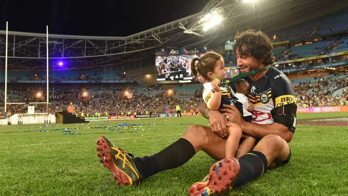 Cowboys captain Johnathan Thurston with his daughter.