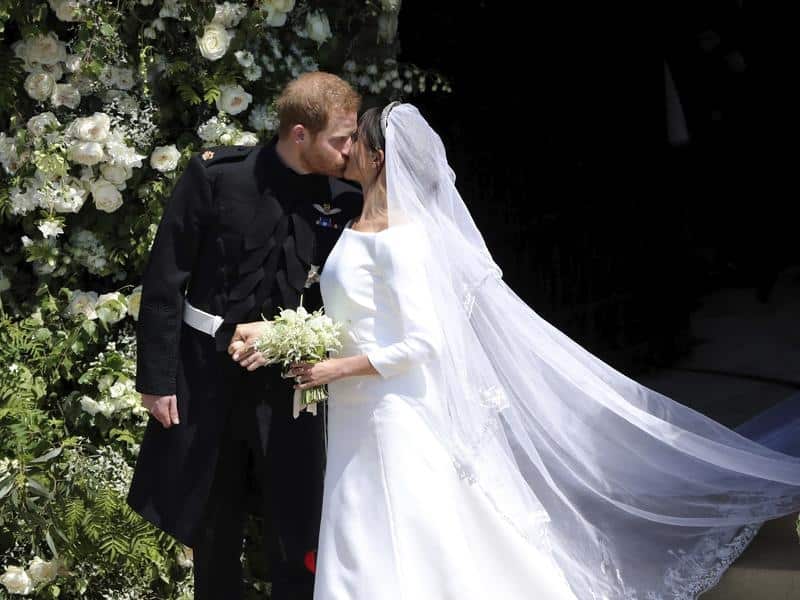 Prince Harry and Meghan Markle kiss after their wedding.