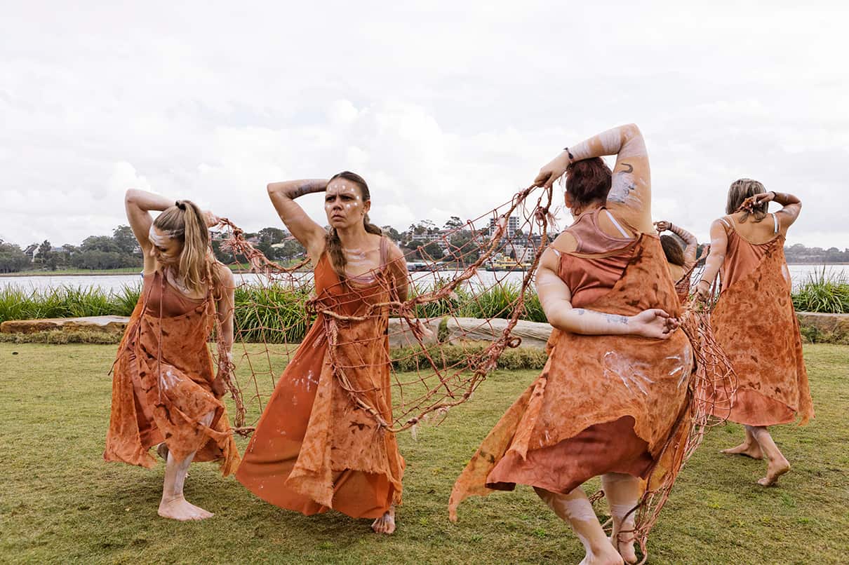 Jannawi Dance clan perform their fishing net dance at the opening of Sculpture at Barangaroo