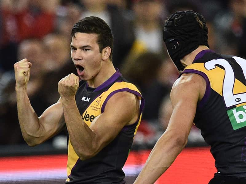 Daniel Rioli (L) and Ben Griffiths of the Tigers