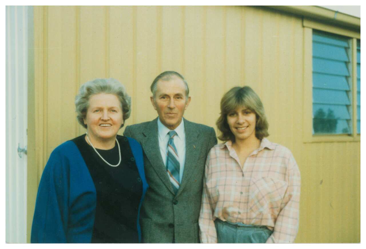 Ali with her adoptive parents