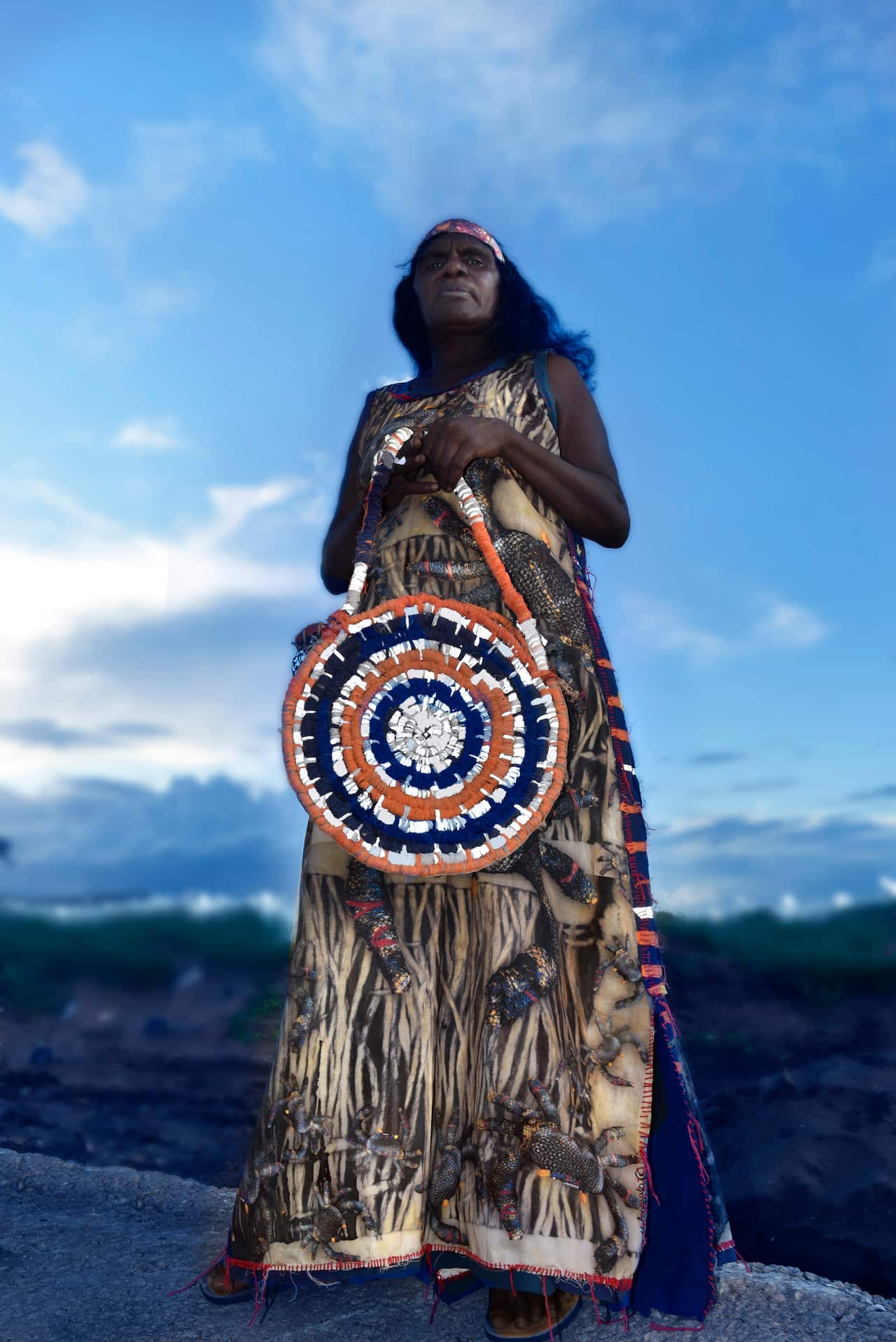 Anindilyakawa Arts, Annabel Amagula in her Digital printed and bush dyed dress