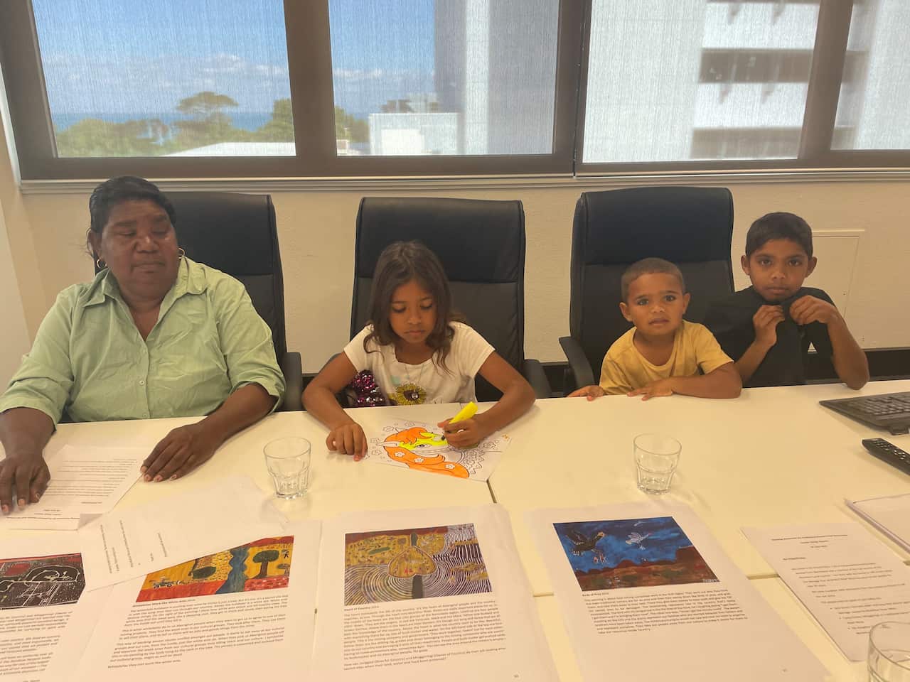 NT traditional owner with their children at the Juukan Gorge inquiry