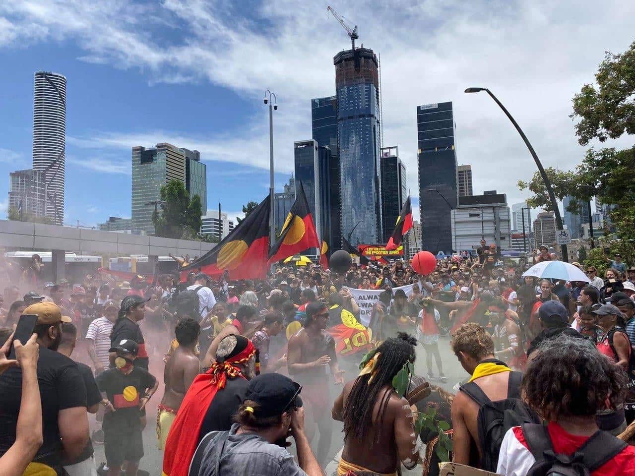 Protestors chanted as they crossed the bridge over to South Brisbane heading towards Musgrave Park