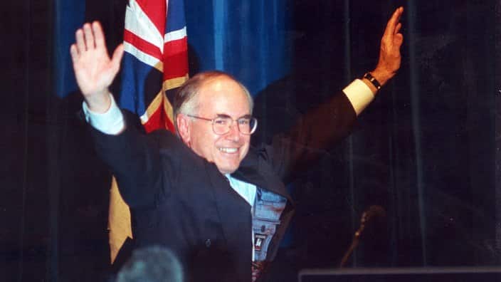 Sydney, May 20, 2004. FILE PIC FROM 1996 - Liberal party leader John Howard waves to the crowd in a Sydney Hotel on 2 March, 1996, as he acknowledges his federal election victory. (AAP Image) NO ARCHIVING
