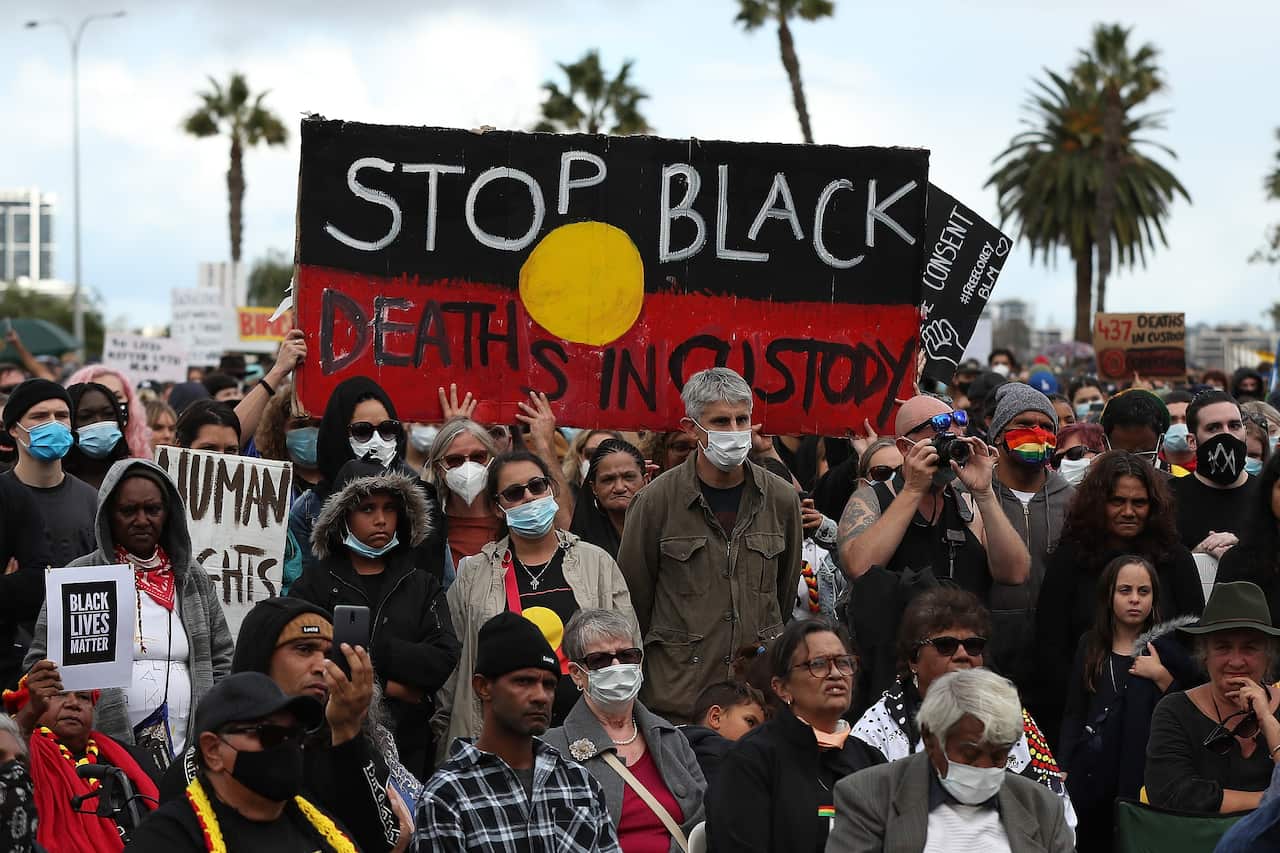 Protesters show their support during the Black Lives Matter Rally in Perth.