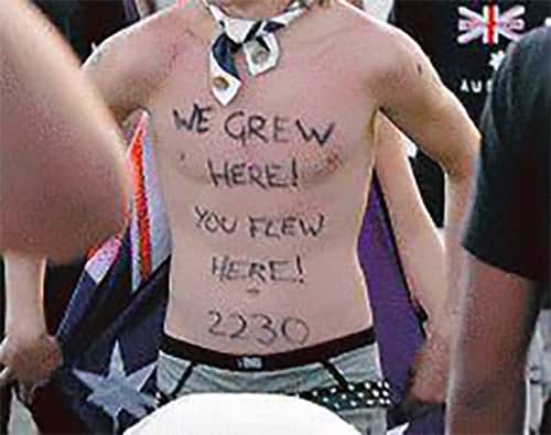 Protester wearing 2230 postcode for Cronulla.