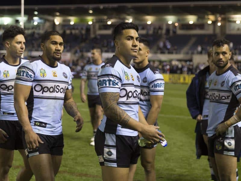 Dejected Cronulla players.