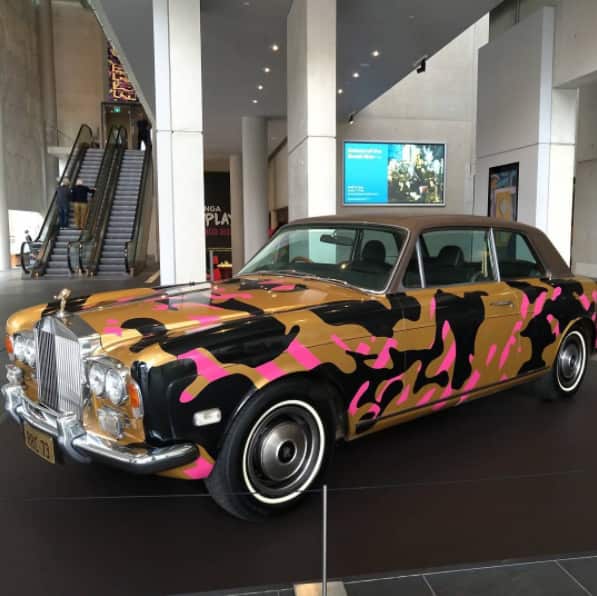 Reko Rennie's gold-camouflage Rolls Royce in the front entrance of the National Gallery of Australia, Canberra.
