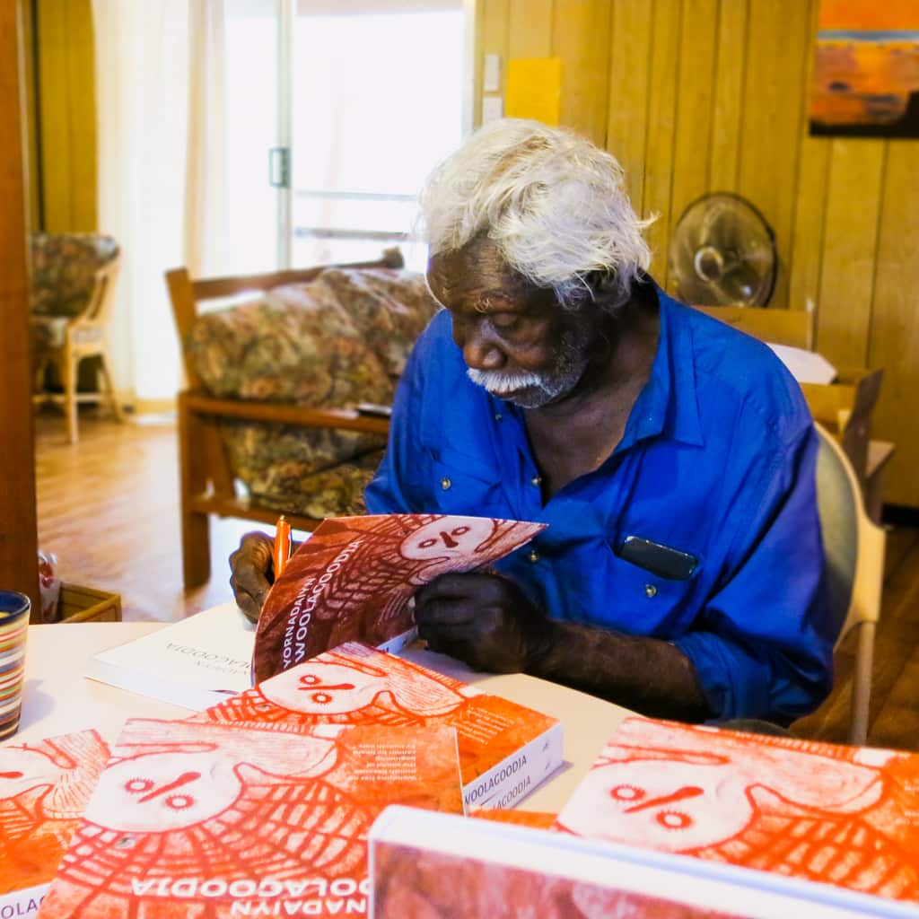 Yornadaiyn Woolgoodja signing books.