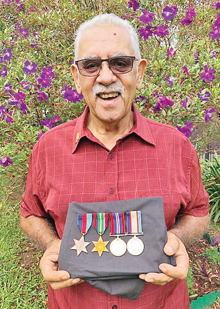 Edgar Williams Jnr with his father's service medals. 