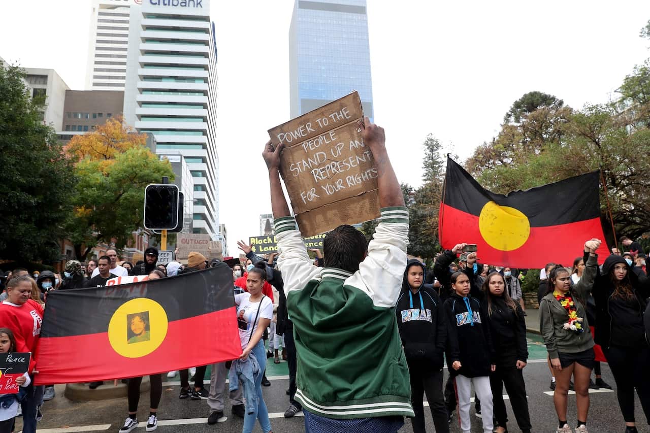 A Black Lives Matter rally in Perth, 12 June 2020. Protesters have called for an end to the over-incarceration of Indigenous Australians.