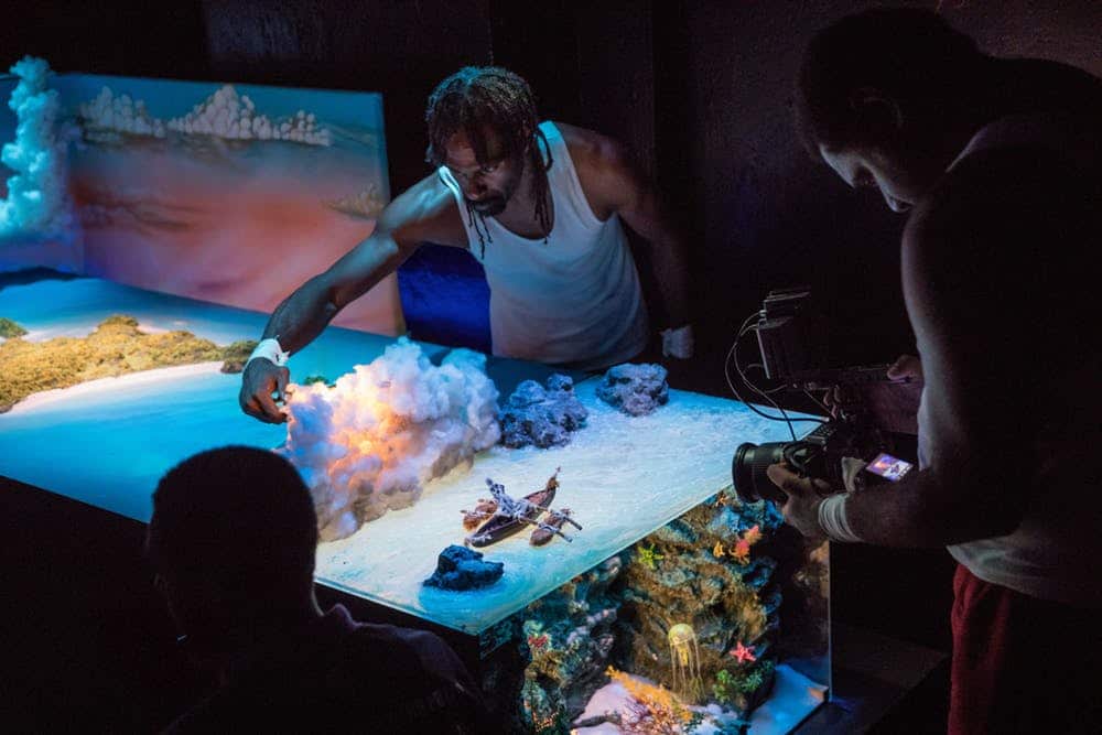 A model of the island is projected live onto screen.