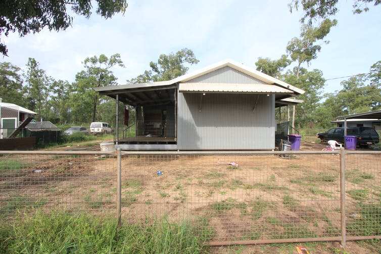 House behind a fence
