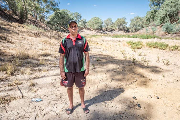Michael Kennedy, chairperson of the Wilcannia Local Aboriginal Land Council, on the Darling riverbed. John Janson-Moore