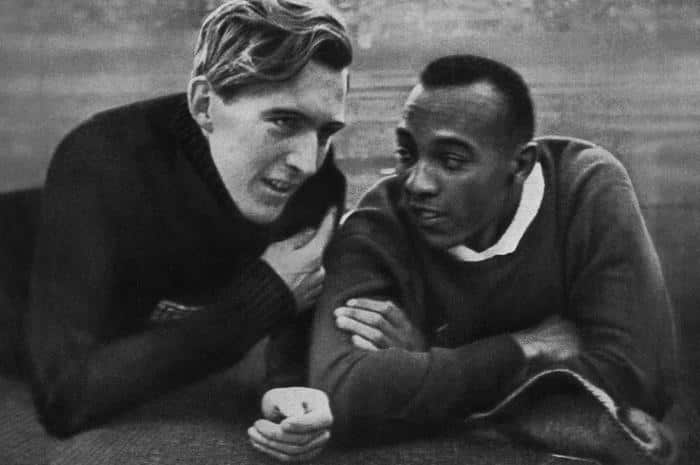 US champion Jesse Owens (R) and German c