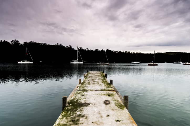 Concrete Jetty with Sailing Yachts in the Background
