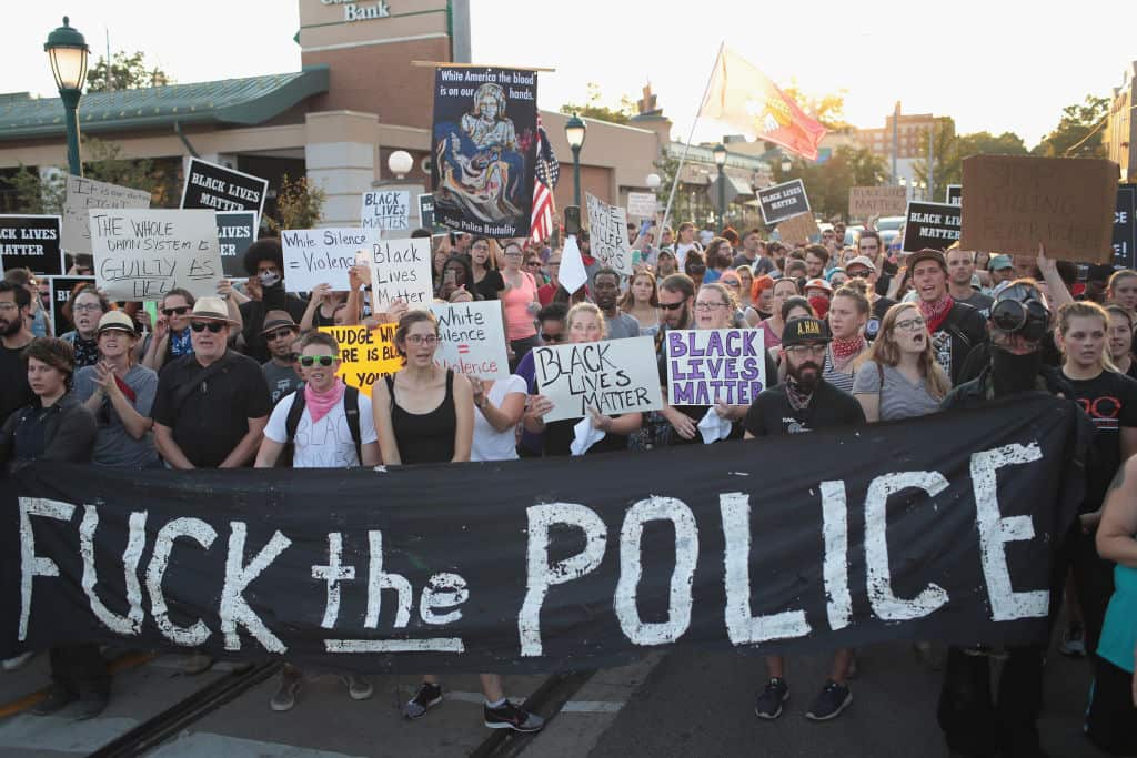 Demonstrators protesting the acquittal of former St. Louis police officer Jason Stockley march through University City on September 16, 2017 in St. Louis, Missouri. 