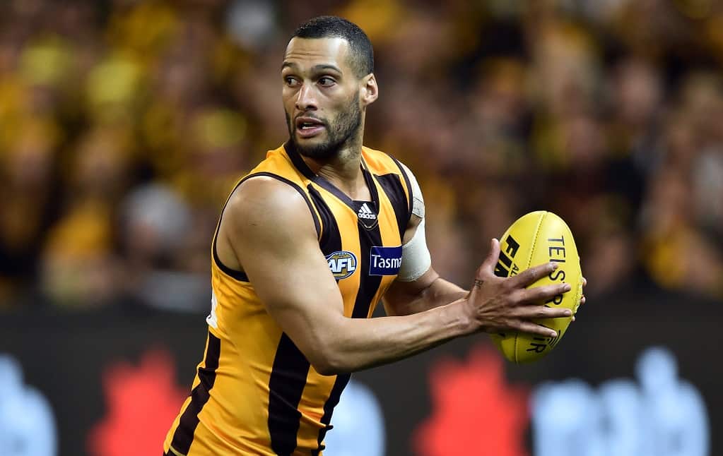Hawthorn Hawks player Josh Gibson possess the ball against the Adelaide Crows in the second semi-final of the AFL at the MCG in Melbourne, Friday, Sept. 18, 2015. (AAP Image/Julian Smith) 