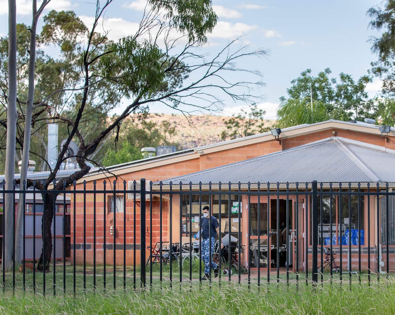 An ADF officer leaves the Hetti Perkins aged care facility.