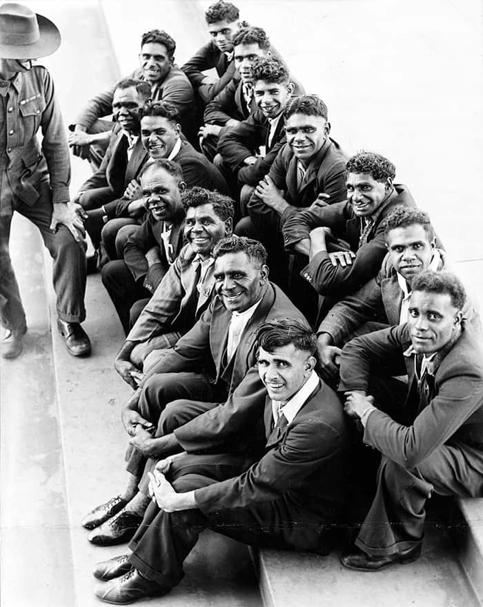 Recruits from Lake Tyers wait outside the Quarter Master’s Store for their Second Australian Imperial Forces uniform, having travelled to Melbourne together and enlisted the previous day.