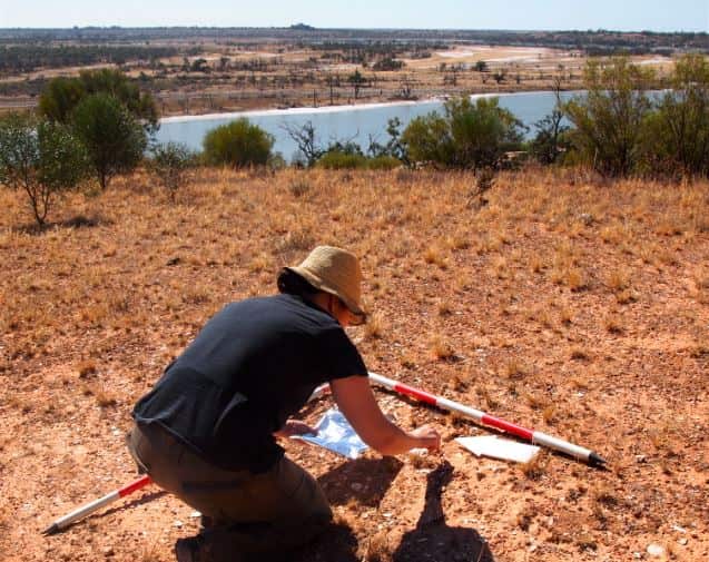 Amy Roberts collecting shell samples.