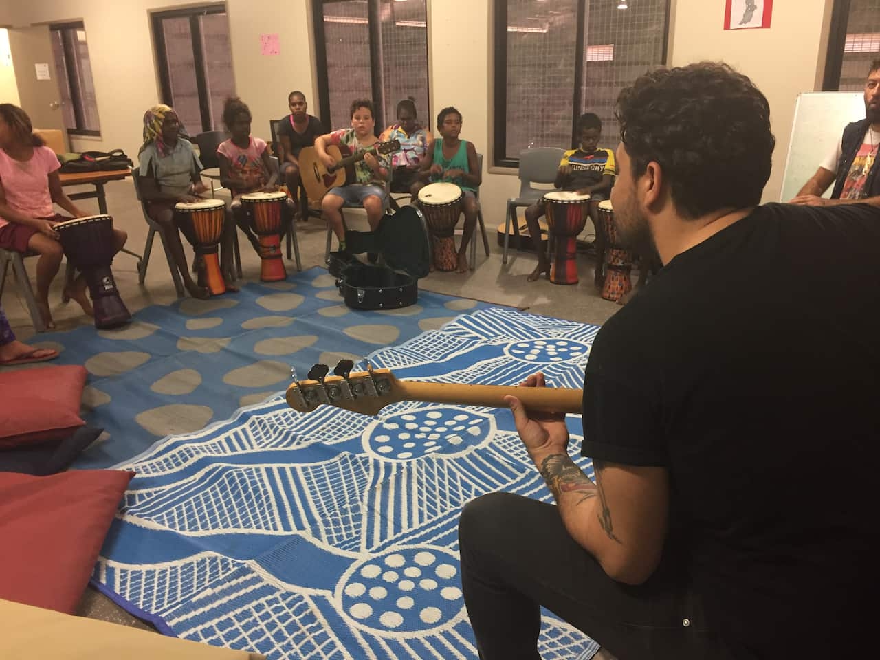 Dan Sultan with Aurukun kids
