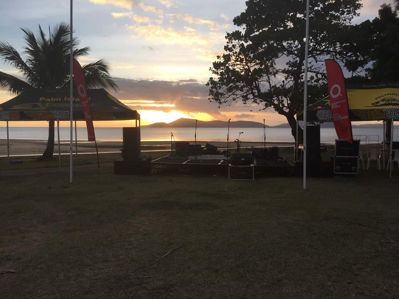 The stage is set against a brilliant backdrop on the Palm Island foreshore.