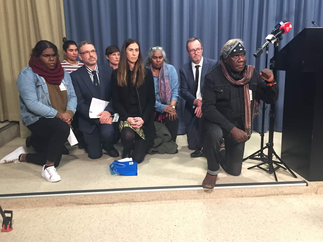 Family of teenager arrested in Surry Hills taking a knee in solidarity