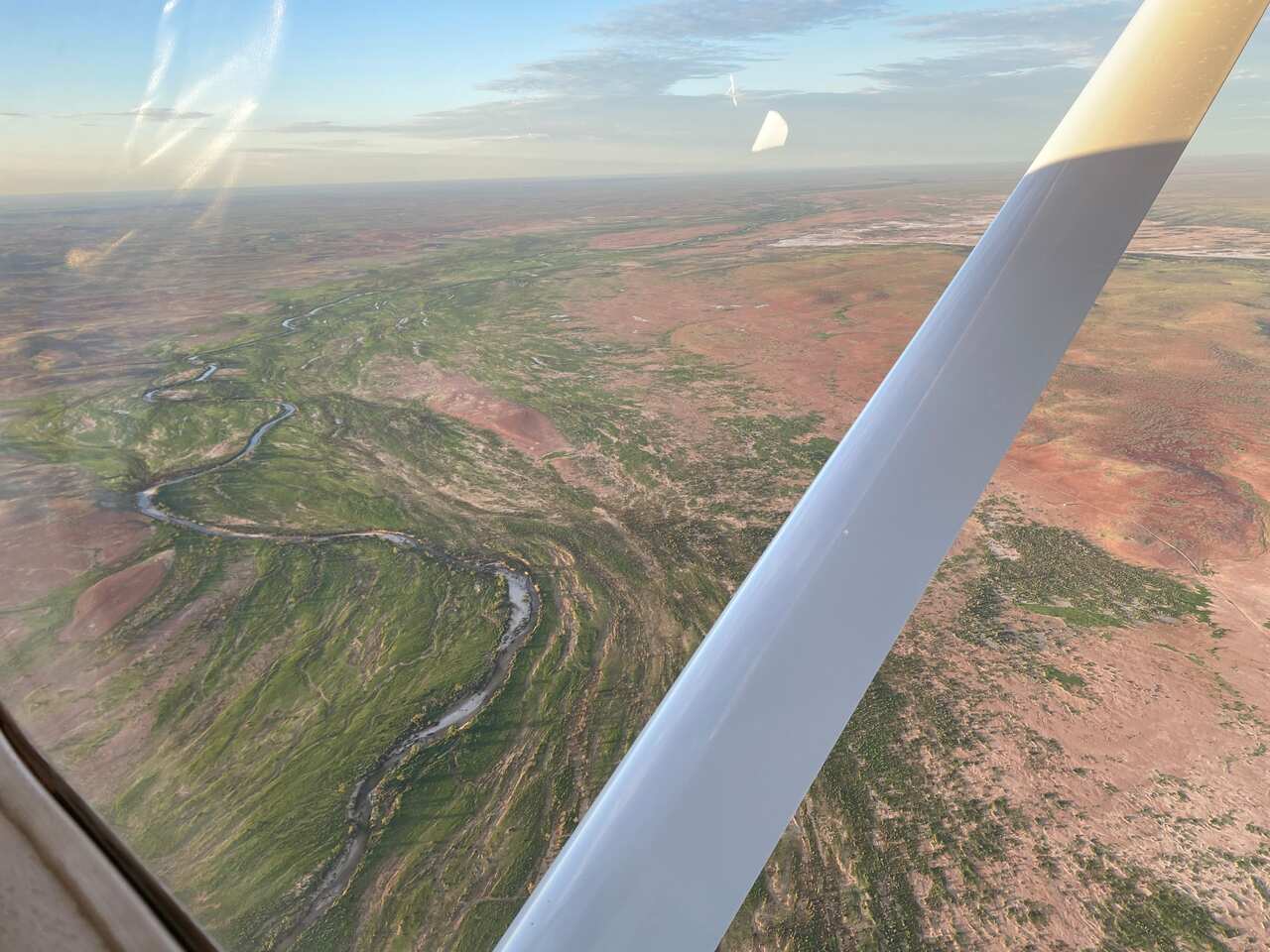 A picture taken from an aircraft showing the green country side after the heavy rainfall. 
