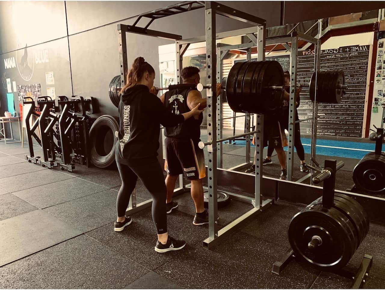 Ebony with a client at Nana Blue.