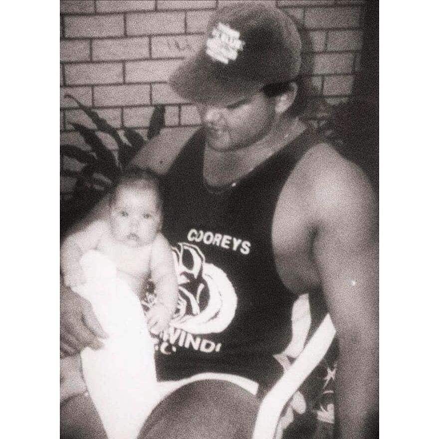 Ebony Grant as a baby with her dad, David 'Nana' Grant.