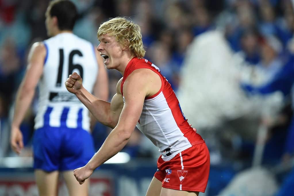 Isaac Heeney of the Swans celebrates his goal during the first AFL semi-final between the Sydney Swans and North Melbourne at ANZ Stadium in Sydney, Saturday, Sept. 19, 2015. (AAP Image/Dean Lewins) NO ARCHIVING, EDITORIAL USE ONLY