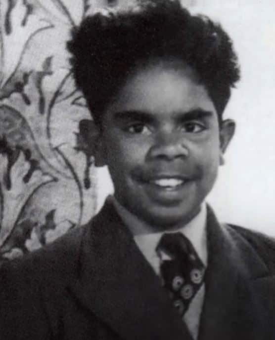A black and white photo of Jack Charles as a young boy