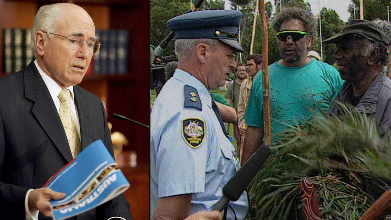 John Howard and protestors